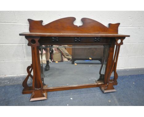 AN ARTS AND CRAFTS WALNUT OVERMANTEL MIRROR, with a shelf supported on a shaped uprights, and a bevelled mirror plate, 138cm 