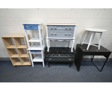 A SELECTION OF MODERN FURNITUE, to include two chest of two drawers, a black finish desk, a pair of white finish bedside cabi