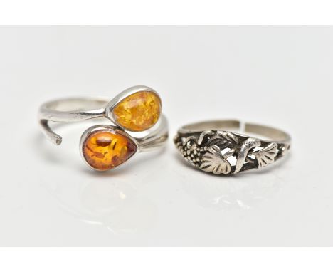 TWO WHITE METAL RINGS, the first of asymmetric design set with two pear copal resin cabochons, stamped 925, ring size P, the 