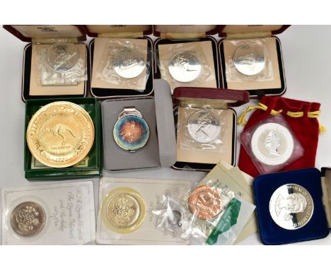 A CARDBOAD BOX CONTAINING SILVER AND SILVER PROOF COINS, to include a 2 OZ .999 silver kookaburra 1992 (Slabbed), a John Pinc