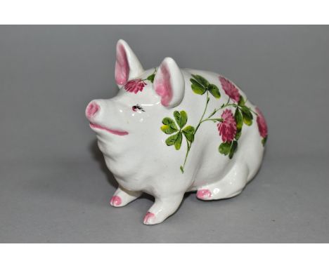 AN EXON WEMYSS PIG, painted with pink clover by Brian Adams, green painted marks to base 'Wemyss Exon 2914, B Adams' with imp