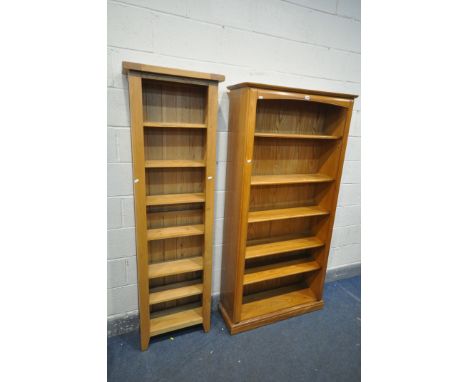 A SLIM LIGHT OAK OPEN BOOKCASE, with adjustable shelves, width 56cm x depth 24cm x height 186cm, and a teak open bookcase, wi