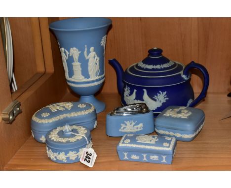 SEVEN PIECES OF WEDGWOOD JASPERWARES, comprising a mid blue dip teapot with applied doves, a pale blue pedestal vase height 1