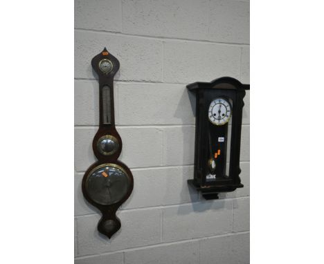AN EARLY 20TH CENTURY EBONISED WALL CLOCK, the enamel dial with roman numerals, height 67cm (winding key) and a 19th century 