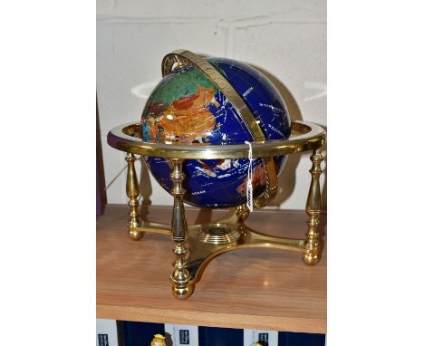 A MODERN TABLE GLOBE, probably dating from early this century due to country names, countries delineated by different natural