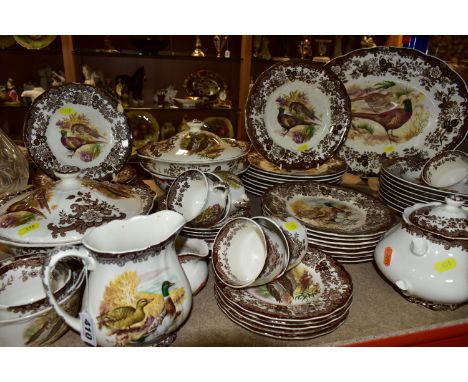 A ROYAL WORCESTER PALISSY 'GAME SERIES' PATTERN DINNER SET comprising one integral gravy jug, one large sugar bowl, one milk 