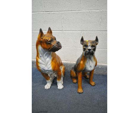 TWO CERAMIC SEATED DOG STATUES, boxer? the tallest dog height 74cm, smallest dog height 64cm (condition - appear in good cond