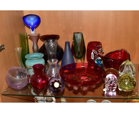 A GROUP OF COLOURED AND DECORATIVE GLASSWARES, twenty one pieces to include Caithness Skyhigh and Selkirk Rubor paperweights,