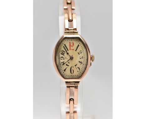 AN EARLY 20TH CENTURY 9CT ROSE GOLD MANUAL WIND WRISTWATCH, the cream dial with black and red Arabic numerals, blue steel han