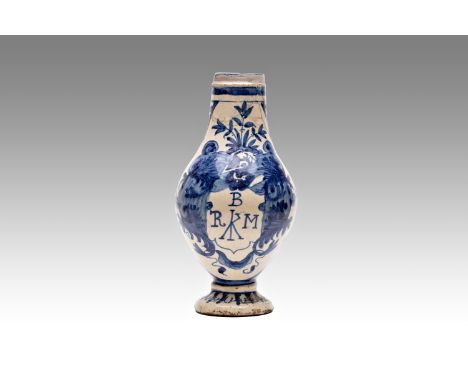 Jug with heraldic emblem, South Europe | height: 26.5 cm | glazed, painted faience. Pitcher on gourd-shaped plinth, initials 