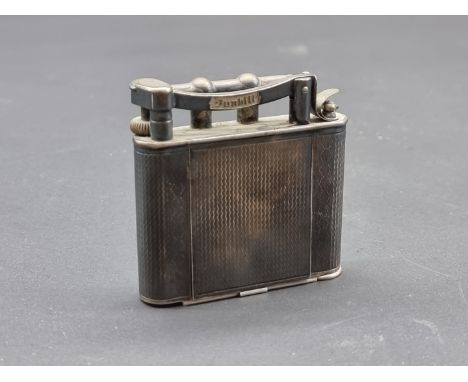 A scarce vintage Dunhill 'The Vanity' lighter,&nbsp;5.9cm high, (lacking fluid reservoir).