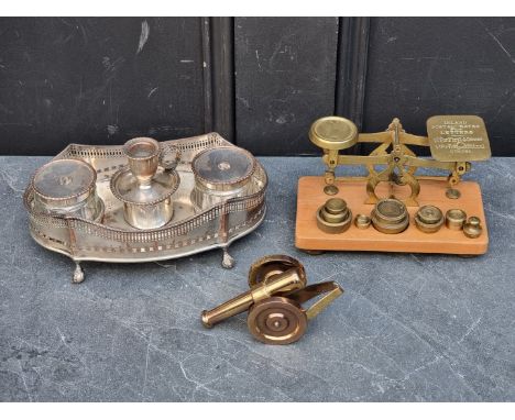 A mixed lot,&nbsp;to include an Old Sheffield plate desk stand, 21cm wide; and a set of postage scales and weights.