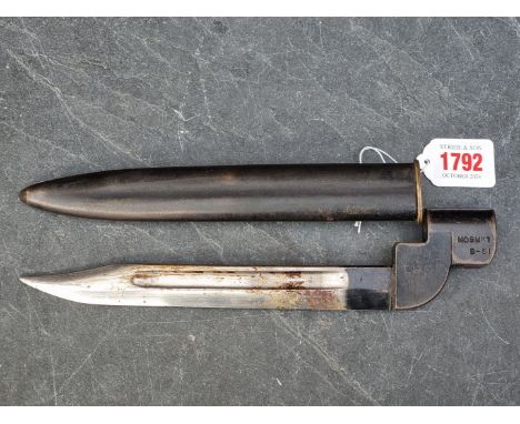 A post war British military&nbsp;Mk1 bayonet and sheath, stamped 'D' for Enfield and dated 1951, with 20cm blade.