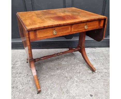 A 19th century mahogany and crossbanded sofa table,&nbsp;80.5cm wide when closed.