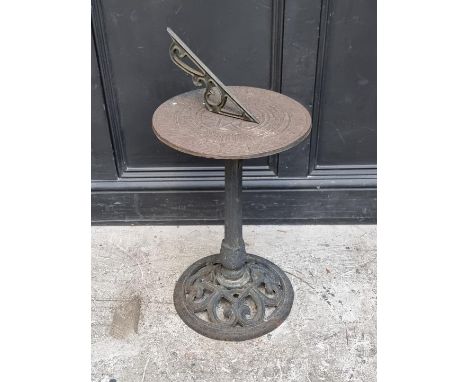 A steel sundial, 71cm high.