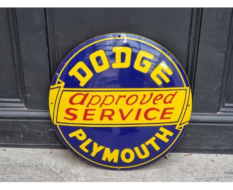 An enamel 'Dodge Plymouth approved Service' convex sign, 56cm diameter.