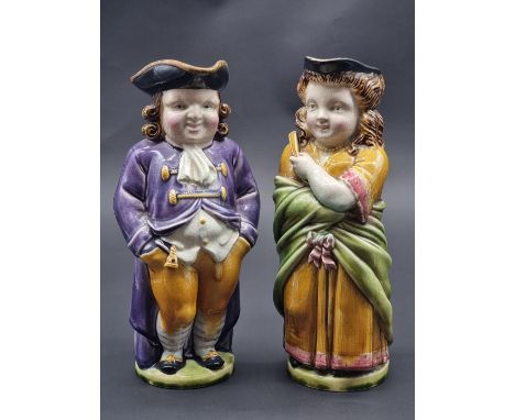 A scarce pair of Mintons majolica Toby jugs,&nbsp;circa 1870s, 28cm high.