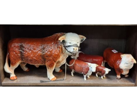 A group of Beswick, Melba and other similar pottery cows,&nbsp;largest 43cm wide. (5)