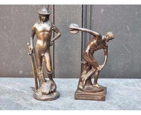 After Donatello,&nbsp;a bronze figure of David, 25cm high; together with another bronze figure of Discobolus, 15cm high. (2)