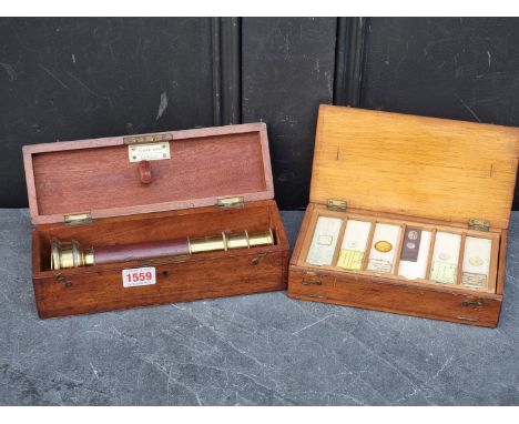 A lacquered brass field microscope, 22.5cm&nbsp;long, in mahogany box bearing ivory label inscribed 'James How, 2 Foster Lane