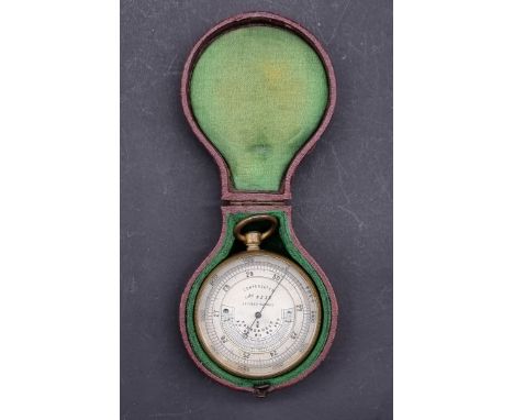 A late 19th century gilt brass combined pocket barometer and thermometer,&nbsp;the silvered dial inscribed 'Optiker Ruhnke, N