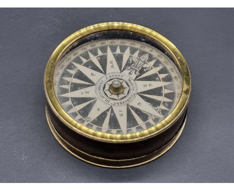 A brass cased compass,&nbsp;inscribed 'Made by Spencer &amp; Co, 111 Minories, London', 8.2cm diameter.