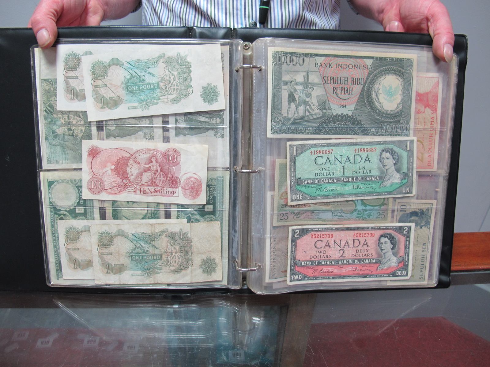 A Collection Of Banknotes Of The World. The Collection Includes GB ...