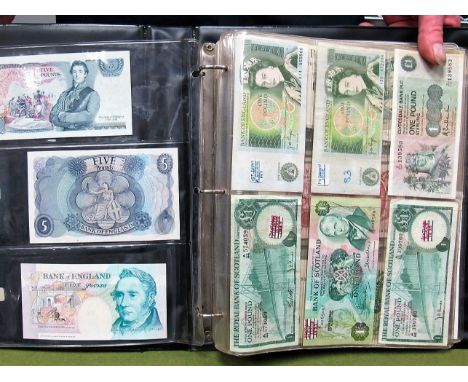 A Collection of Banknotes of the World. The collection includes GB banknotes having a face value of twenty-five pounds and a 