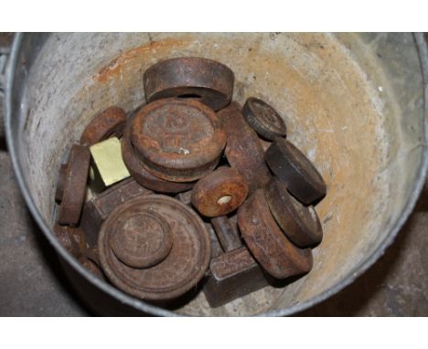 A BUCKET OF SCALE WEIGHTS