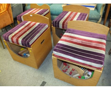 A SET OF FOUR LIGHT OAK STORAGE STOOLS