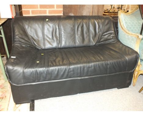 A MODERN BLACK LEATHER TWO SEATER SOFA