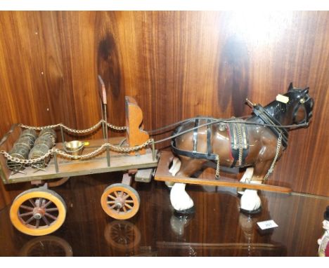 A VINTAGE CERAMIC HORSE AND CART FIGURE 