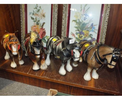 FOUR CERAMIC SHIRE HORSE FIGURES 