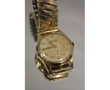 A VINTAGE 9 CARAT GOLD BUREN  GRAND PRIX WRISTWATCH 