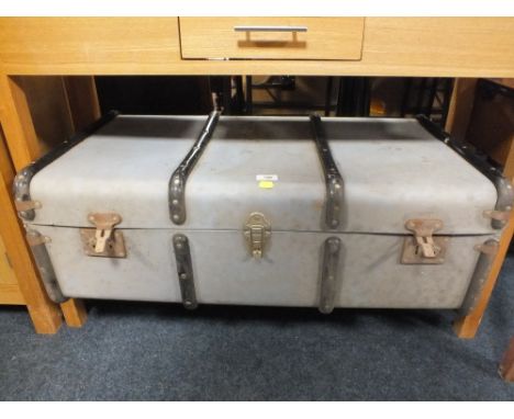 A VINTAGE BANDED TRUNK