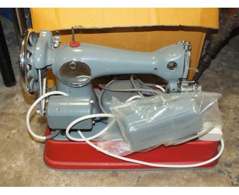 A VINTAGE JONES SEWING MACHINE