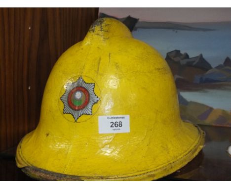 A SOUTH YORKSHIRE COUNTY FIRE SERVICE FIREMAN'S HELMET