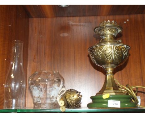 A CONVERTED BRASS OIL LAMP WITH SHADE, FLUE, AND ORIGINAL BURNER 