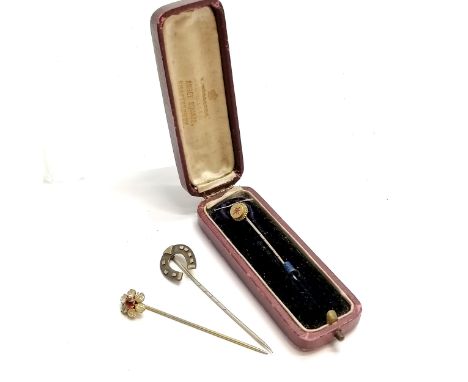 9ct marked gold ruby set stick pin in Woodcock (Shaftesbury) retail box t/w sterling silver (&amp; unmarked gold) horseshoe p