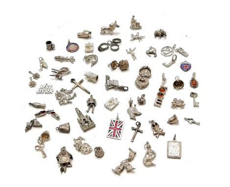 Qty of silver charms inc cuckoo clock, 3 wise monkeys, Union Jack flag etc - total weight 115g 