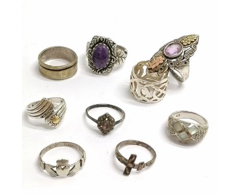 9 x silver rings inc crucifix, amethyst (with gold detail), claddagh etc - total weight 49g ~ some slight a/f &amp; marcasite