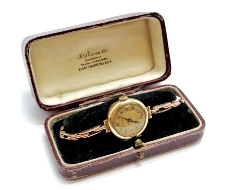 9ct gold J W Benson (London) manaul wind ladies wristwatch on a marked 9ct rose gold sprung bracalet in the original retail b