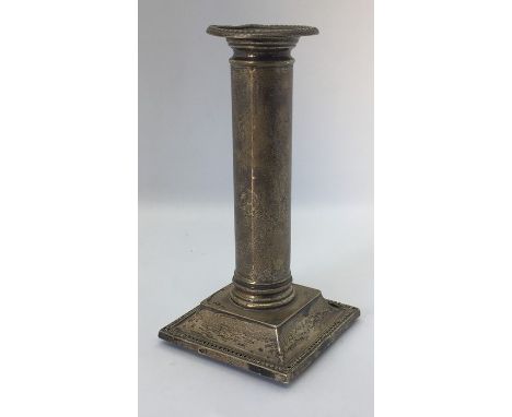 A hallmarked silver candlestick, 16cm height