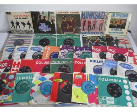 A collection of 1960's 7" vinyl singles including The Beatles, Bob Dylan, The Hollies, Pink Floyd, Moody Blues, The Shadows, 