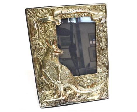 AN AUSTRALIAN COMMEMORATIVE SILVER PHOTO FRAME  with embossed kangaroo decoration, stamped 1788-1988, 21cm x 16cms Condition 