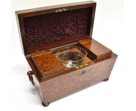 A VICTORIAN AMBOYNA TEA CADDY OF SARCOPHAGHUS FORM  with two compartments and (associated) mixing bowl, 32cm wide