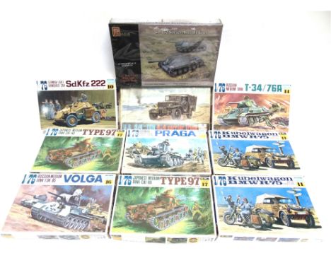 EIGHT 1/76 SCALE FUJIMI UNMADE PLASTIC MILITARY KITS  together with two 1/72 unmade plastic military kits by Esci (1), and Pe