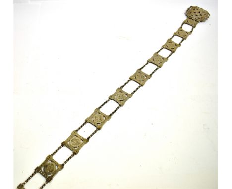 A CELTIC DESIGN SILVER BELT AND BUCKLE  the buckle and links of square openwork design with Tudor Rose motif to centre, two r