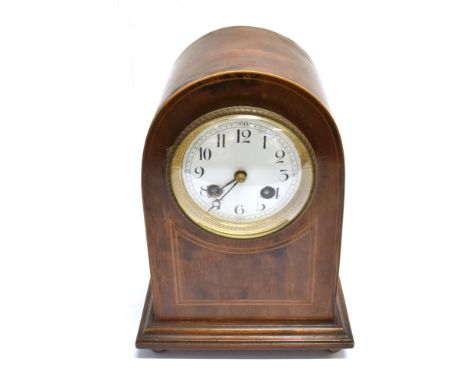 AN EDWARDIAN INLAID MAHOGANY MANTLE CLOCK  with white enamel face and French eight-day movement