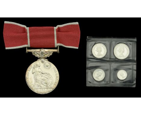 A post-War B.E.M. awarded to Mrs. Phoebe Grange, together with a set of Maundy Money presented to her at Newcastle Cathedral 